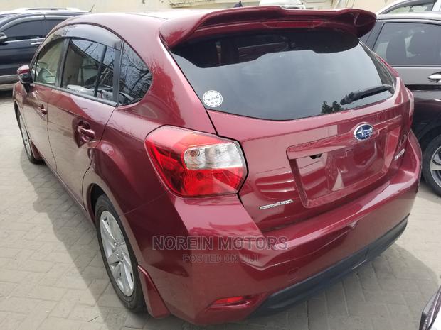 2014 Subaru Impreza in Red - Compact Sedan for Adventure