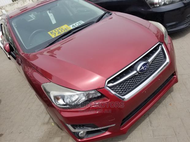 2014 Subaru Impreza in Red - Compact Sedan for Adventure