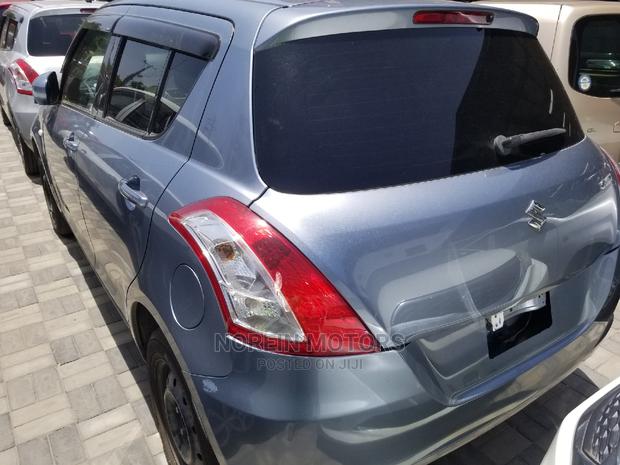 2014 Suzuki Swift in Blue: Compact Car, Perfect for You