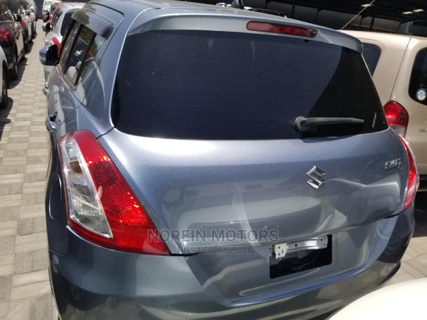 2014 Suzuki Swift in Blue: Compact Car, Perfect for You