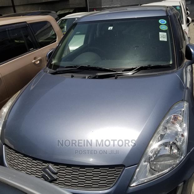 2014 Suzuki Swift in Blue: Compact Car, Perfect for You