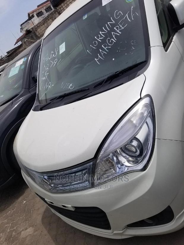 Compact 2015 Suzuki Solio White: Modern, Stylish, and Efficient