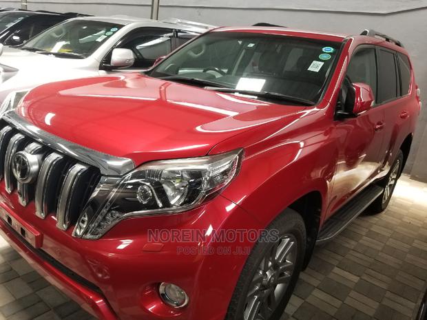 Red 2015 Toyota Land Cruiser Prado - Affordable Pre-owned SUV