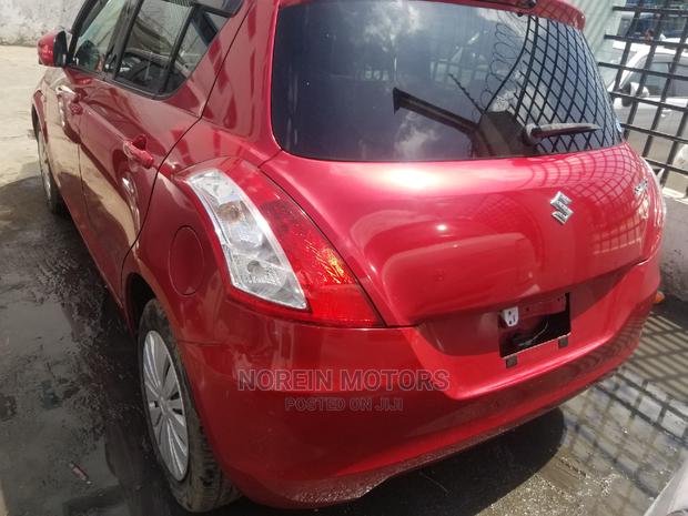 Red 2014 Suzuki Swift: Affordable Compact Car