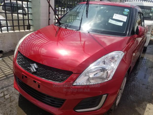 Red 2014 Suzuki Swift: Affordable Compact Car