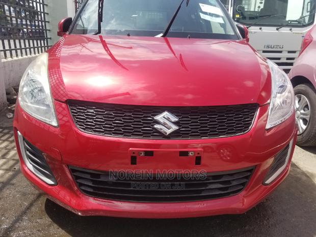 Red 2014 Suzuki Swift: Affordable Compact Car