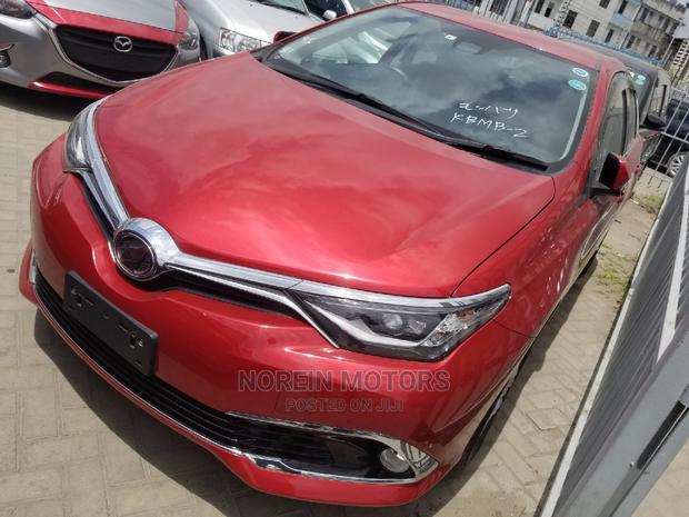 Red Toyota Auris 2015 - Premium Pre-Owned Sedan for Sale