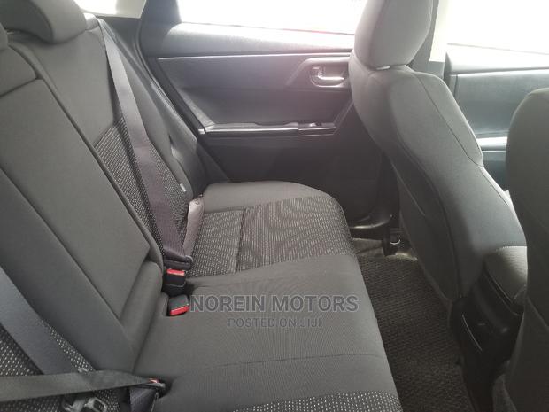 Red Toyota Auris 2015 - Premium Pre-Owned Sedan for Sale