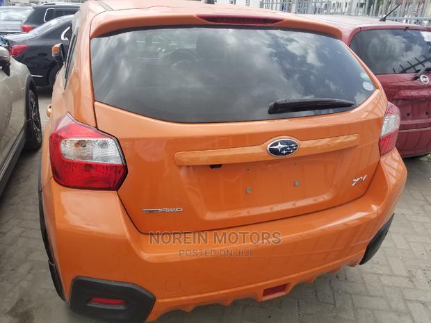 2014 Subaru XV Orange: Adventure-Ready Compact SUV