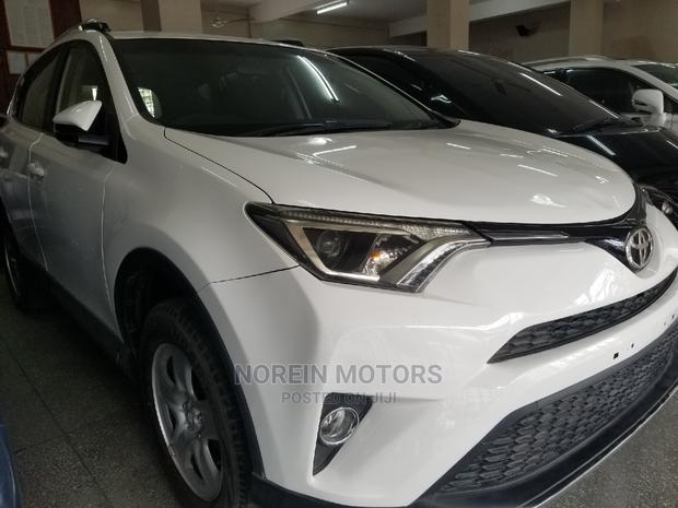 Orange 2015 Toyota RAV4: Top-Rated Pre-Owned SUV