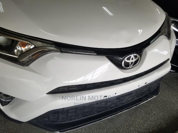 Orange 2015 Toyota RAV4: Top-Rated Pre-Owned SUV