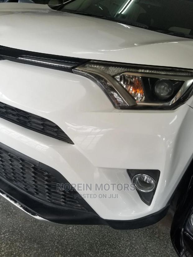Orange 2015 Toyota RAV4: Top-Rated Pre-Owned SUV