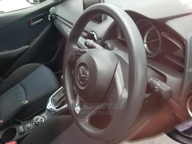 2014 Mazda Demio in Red - Compact Car for the Modern Driver