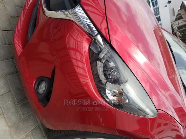 2014 Mazda Demio in Red - Compact Car for the Modern Driver