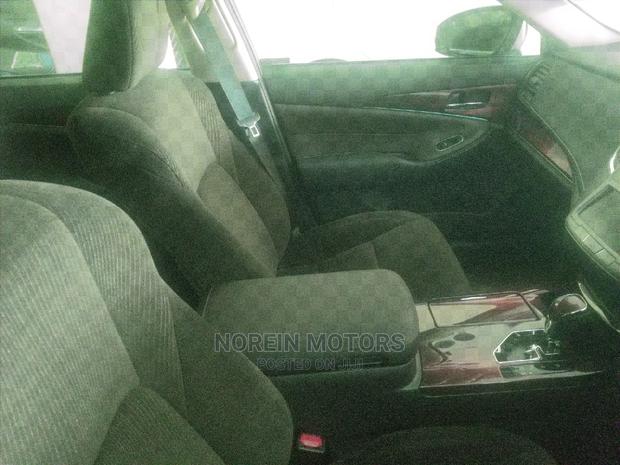 2014 Toyota Crown - Orange Hue: Ready for Adventure