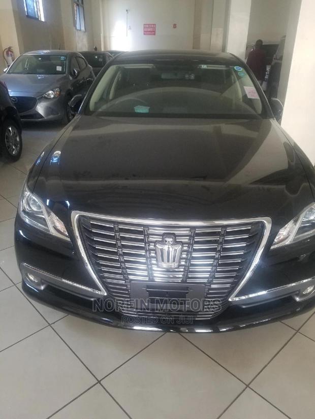 2014 Toyota Crown - Orange Hue: Ready for Adventure