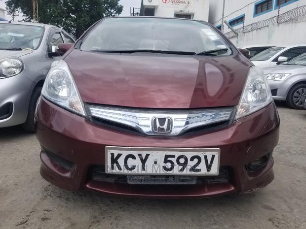 Red 2014 Honda Fit: Compact Car, Stylish Design