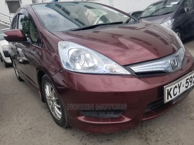 Red 2014 Honda Fit: Compact Car, Stylish Design