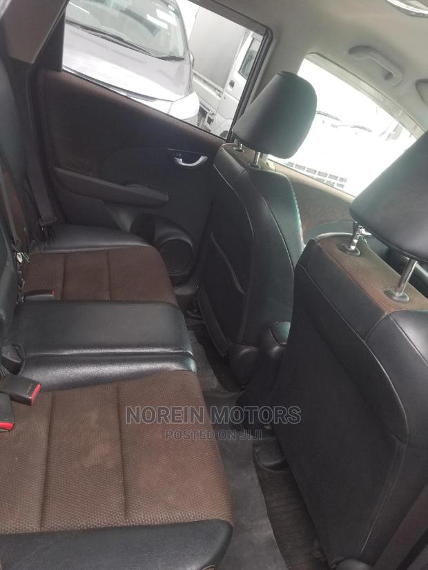 Red 2014 Honda Fit: Compact Car, Stylish Design