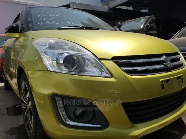 Gold 2014 Suzuki Swift: Compact Car with a Classic Look