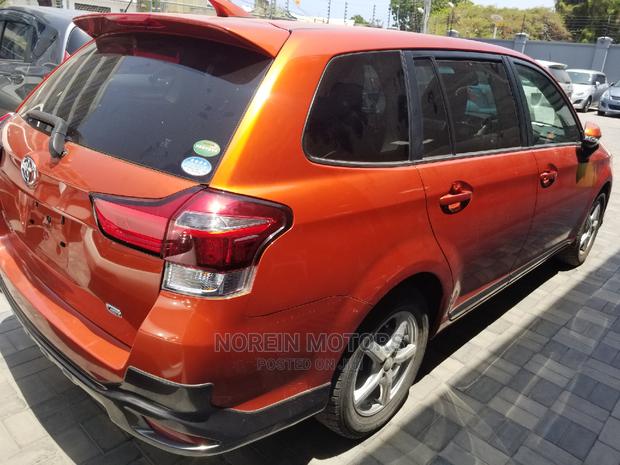 2016 Toyota Fielder in Orange: Compact and Comfortable Sedan