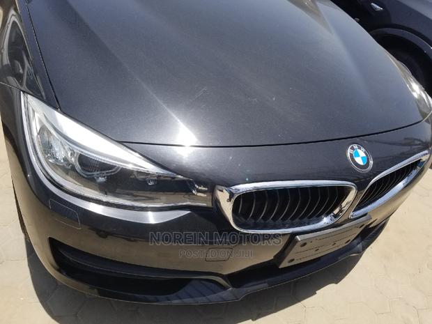 2014 BMW 320i SV Premium Red Hatchback