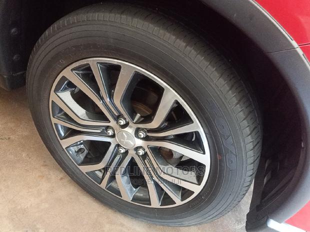 Red 2016 Mitsubishi Outlander: Combining Style and Performance