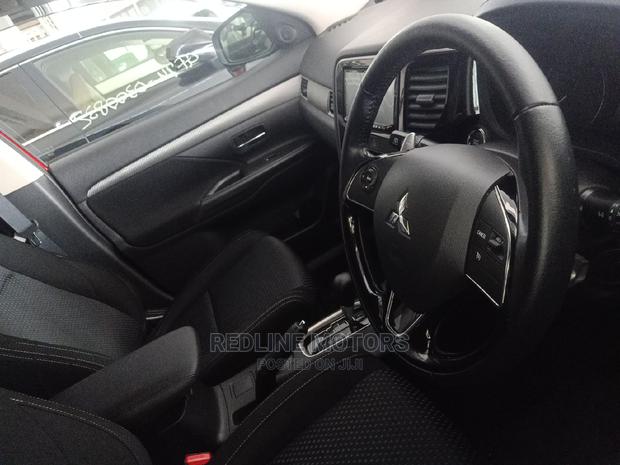 Red 2016 Mitsubishi Outlander: Combining Style and Performance