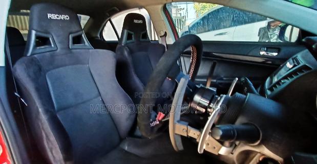 Red 2020 Mitsubishi Lancer Evo: Aggressive Compact Sedan