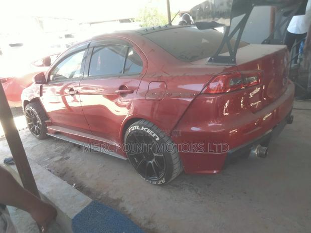 Red 2020 Mitsubishi Lancer Evo: Aggressive Compact Sedan