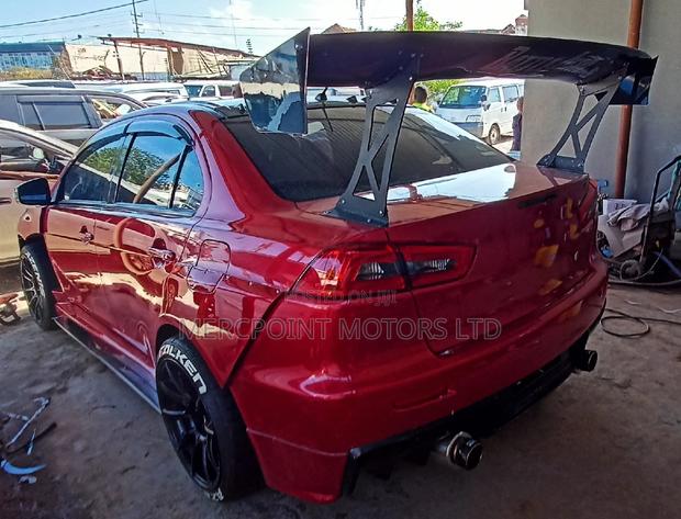 Red 2020 Mitsubishi Lancer Evo: Aggressive Compact Sedan