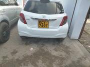 2013 White Toyota Vitz: Compact, Elegant, and Ready for the Road for sale