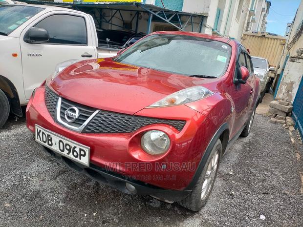 Red Nissan Juke 2013 - Pre-owned Vehicle
