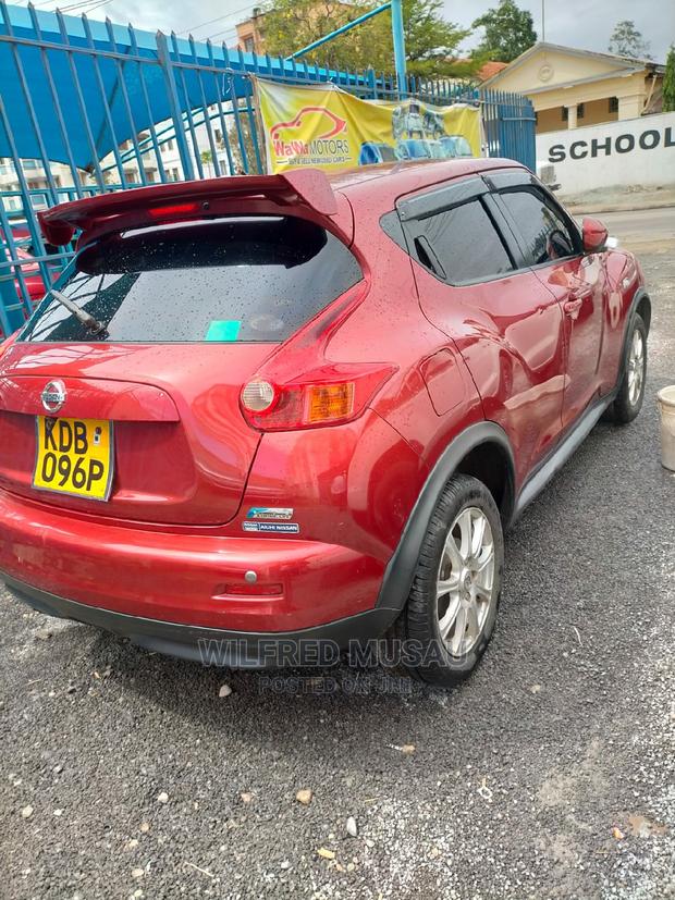 Red Nissan Juke 2013 - Pre-owned Vehicle