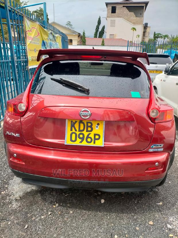 Red Nissan Juke 2013 - Pre-owned Vehicle