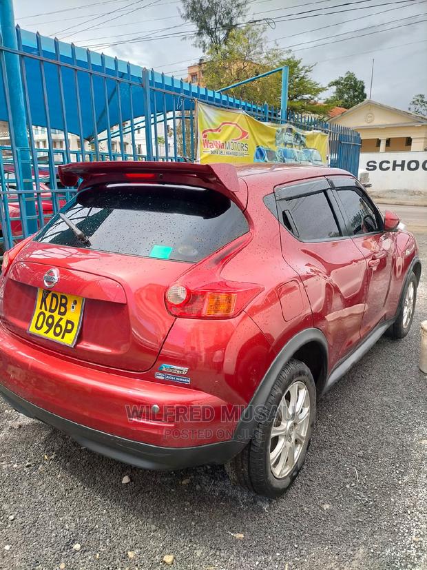 Red Nissan Juke 2013 - Pre-owned Vehicle
