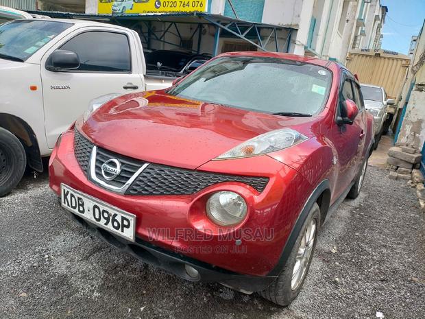 Red Nissan Juke 2013 - Pre-owned Vehicle