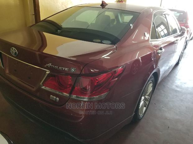 2015 Red Toyota Crown - Sophisticated, Stylish, and Powerful