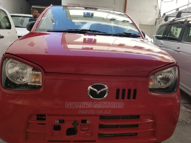 Red Mazda Carol 2014: Compact Car Excellence