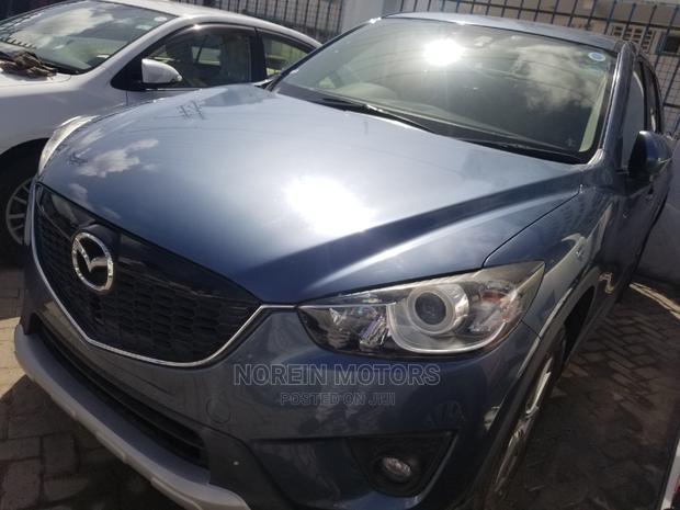 2014 Mazda CX-5 SV Premium Blue - Pre-Owned Excellence