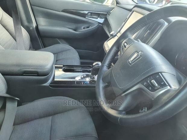 2016 Toyota Crown in White: Modern, Spacious Sedan