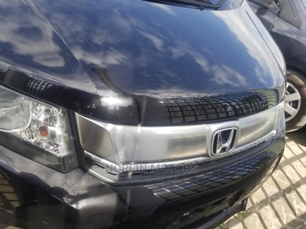 Black 2015 Honda Freed: Efficient and Practical MPV for Everyday Use