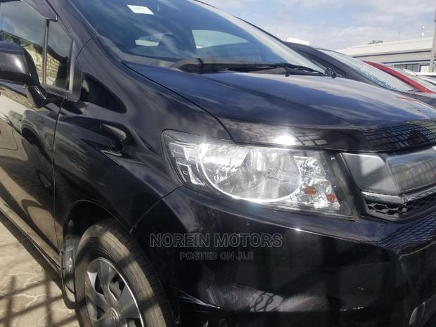 Black 2015 Honda Freed: Efficient and Practical MPV for Everyday Use
