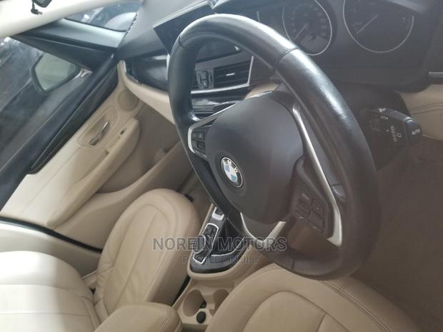 2014 BMW 218i: Gray Compact Sedan with Style