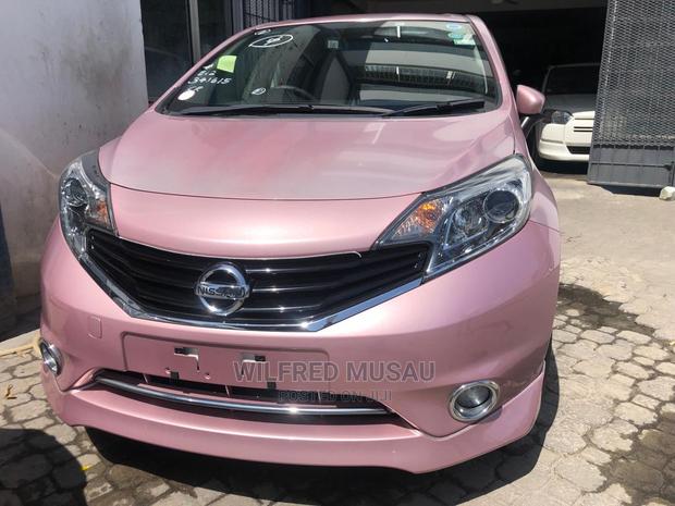 Pink Nissan Note 2015: Compact Car, Stylish, and Spacious