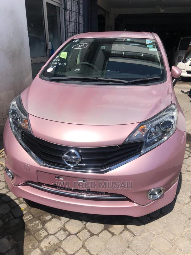 Pink Nissan Note 2015: Compact Car, Stylish, and Spacious