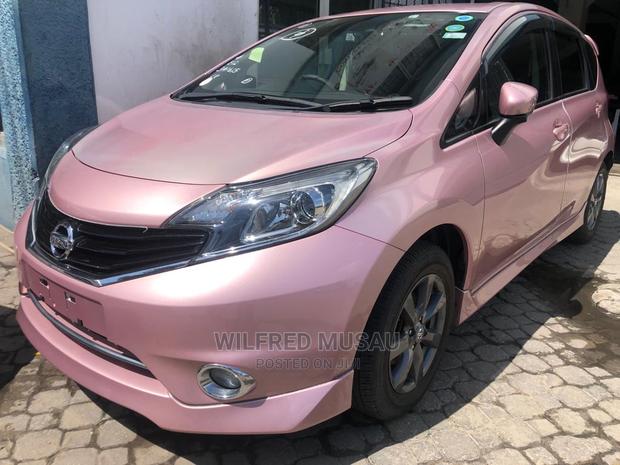 Pink Nissan Note 2015: Compact Car, Stylish, and Spacious