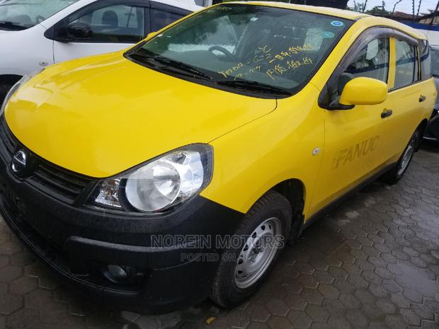 2015 Nissan Advan Yellow - Race-Inspired Performance