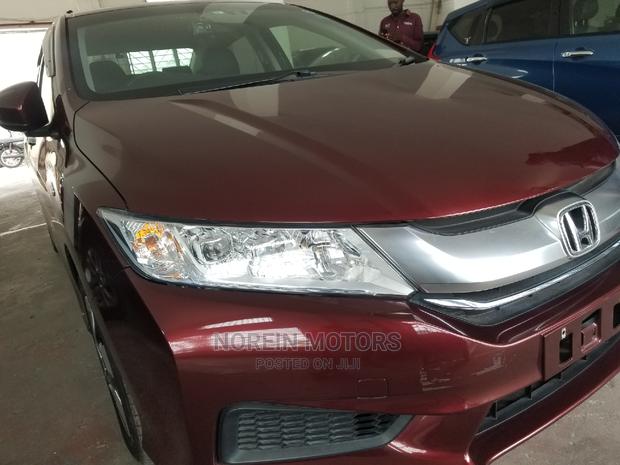 Honda Ballade 2015 in Red: Modern Sedan with Classic Appeal