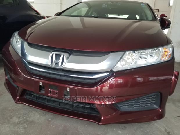Honda Ballade 2015 in Red: Modern Sedan with Classic Appeal